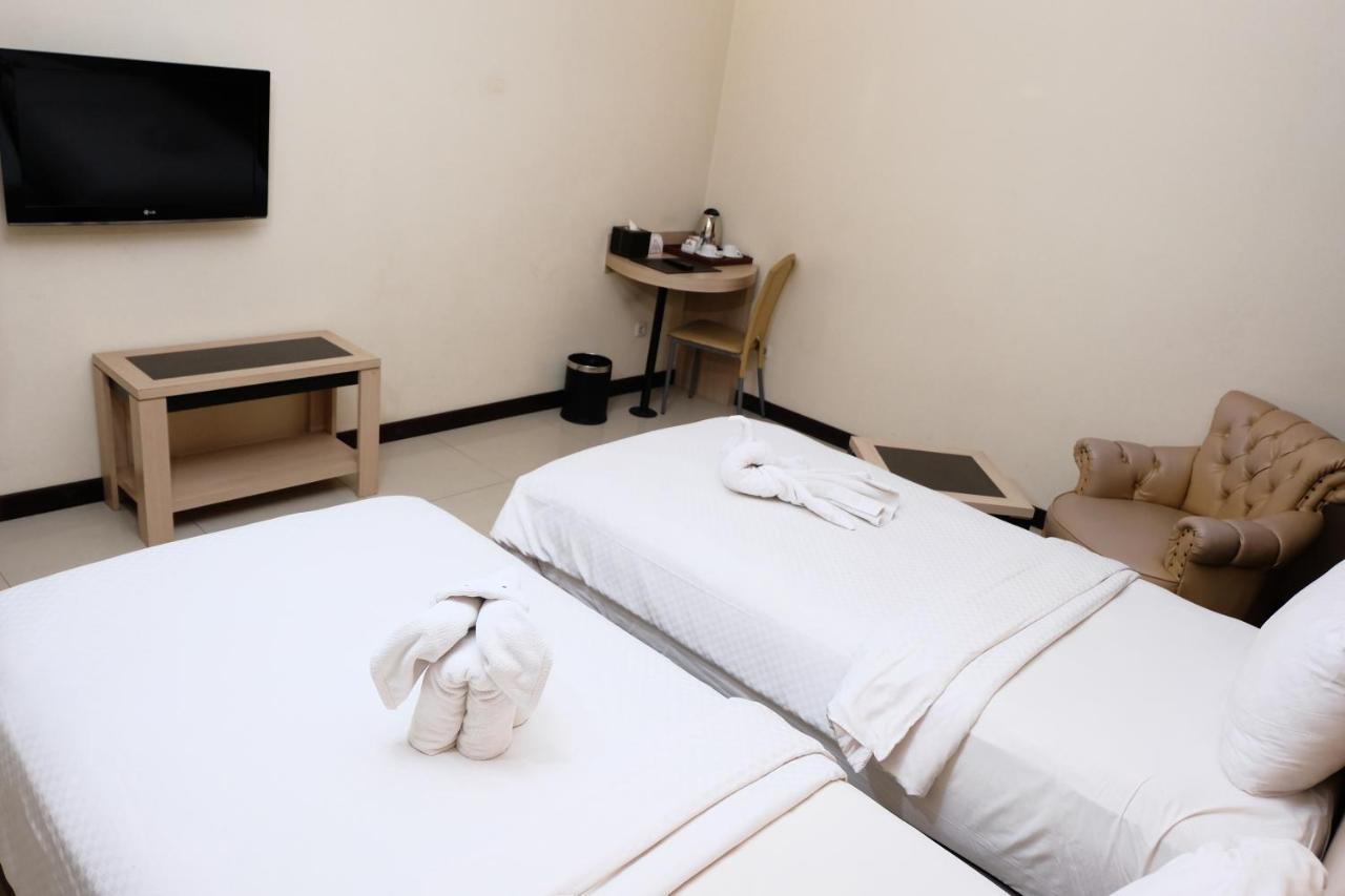 Rio City Hotel Palembang Extérieur photo