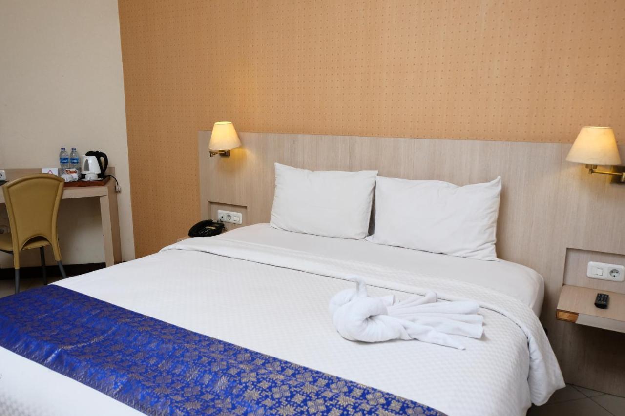 Rio City Hotel Palembang Extérieur photo
