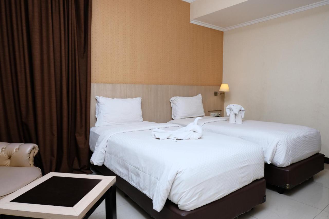 Rio City Hotel Palembang Extérieur photo