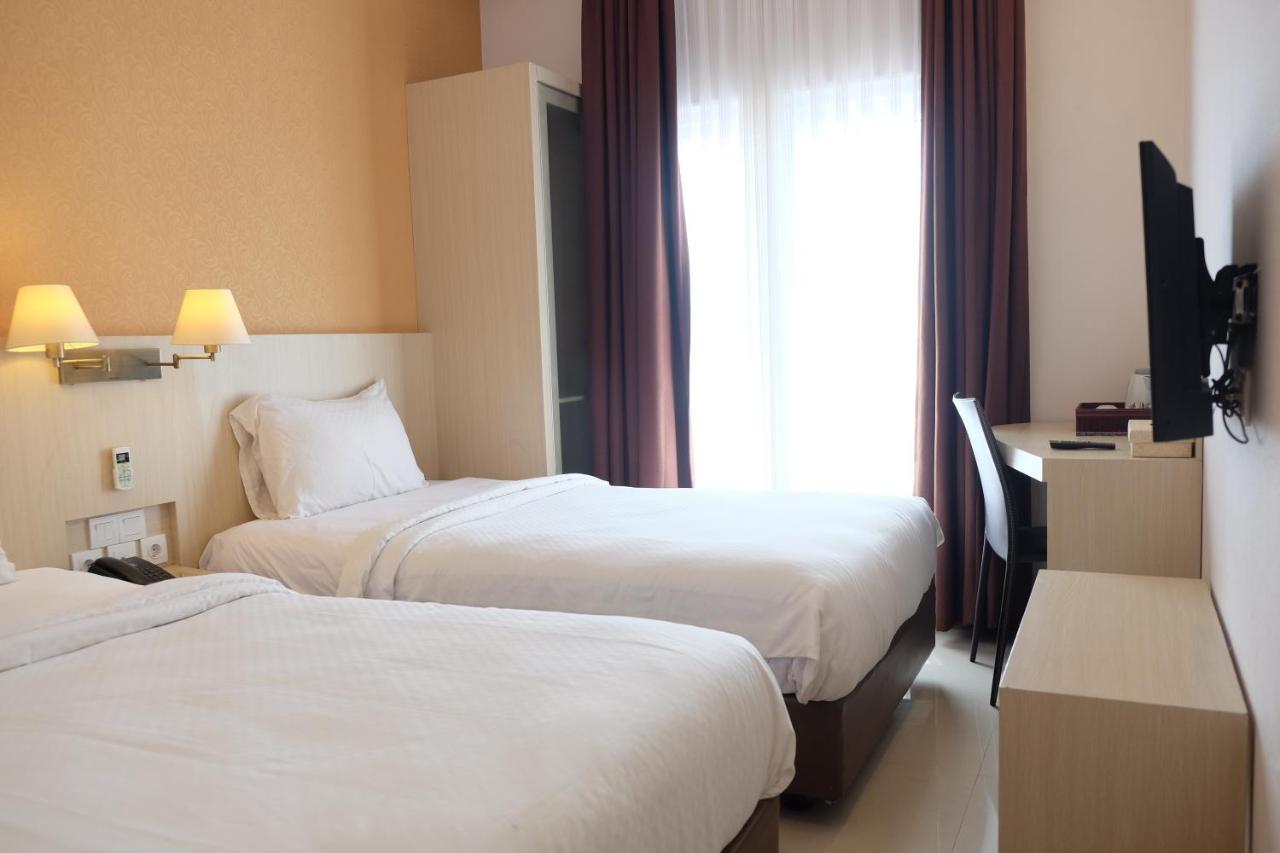 Rio City Hotel Palembang Extérieur photo