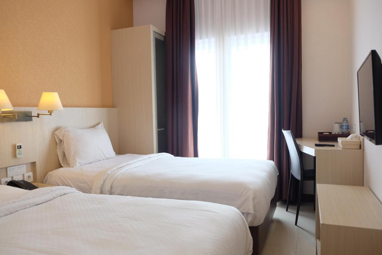 Rio City Hotel Palembang Extérieur photo