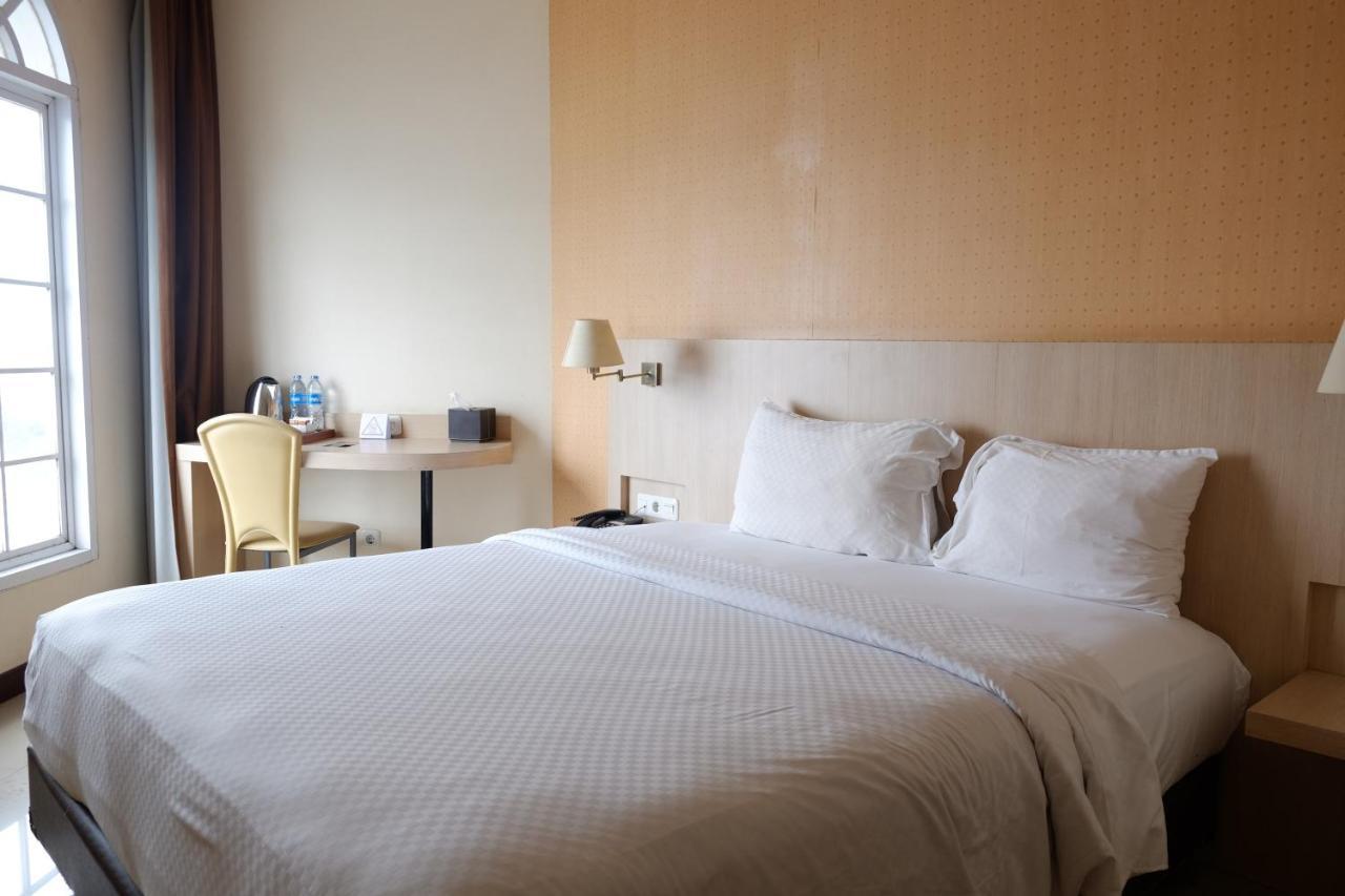 Rio City Hotel Palembang Extérieur photo