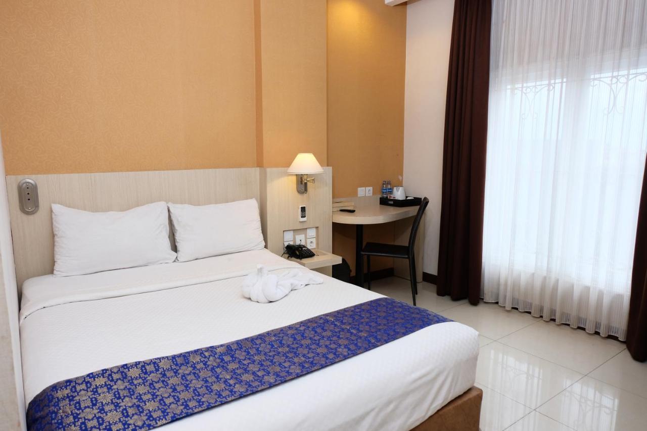 Rio City Hotel Palembang Extérieur photo