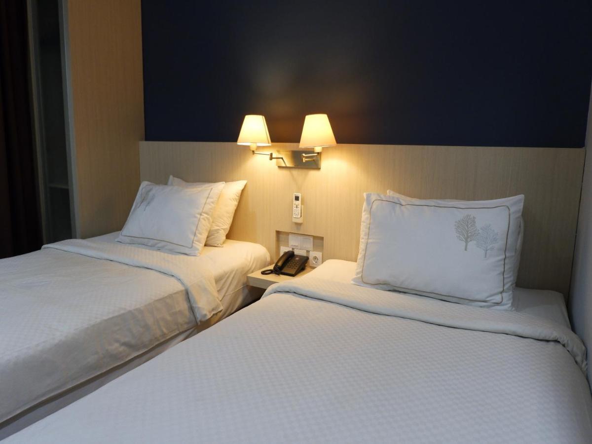 Rio City Hotel Palembang Extérieur photo