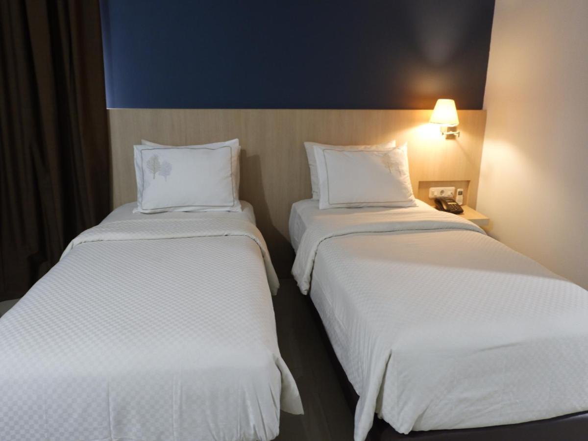 Rio City Hotel Palembang Extérieur photo