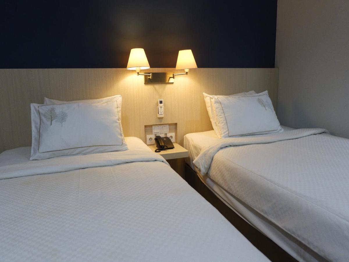 Rio City Hotel Palembang Extérieur photo