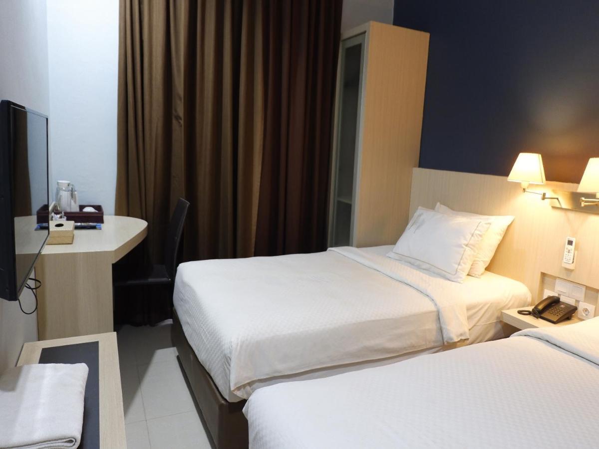 Rio City Hotel Palembang Extérieur photo