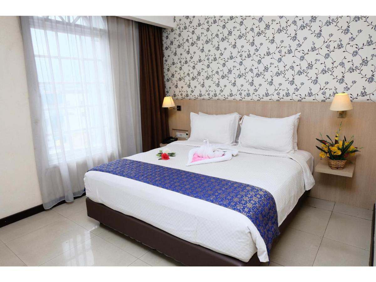 Rio City Hotel Palembang Extérieur photo