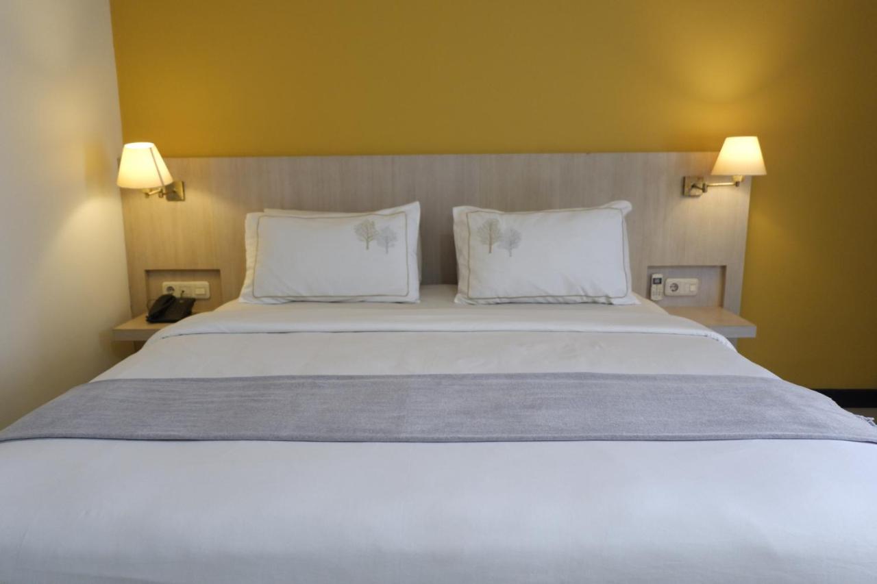 Rio City Hotel Palembang Extérieur photo
