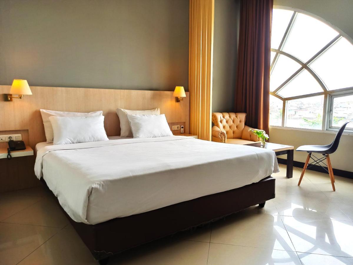 Rio City Hotel Palembang Extérieur photo
